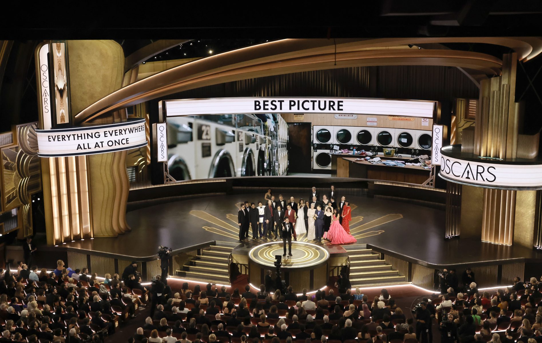 HOLLYWOOD, CALIFORNIA - MARCH 12: Jonathan Wang accepts the Best Picture award for "Everything Everywhere All at Once" along with cast and crew onstage during the 95th Annual Academy Awards at Dolby Theatre on March 12, 2023 in Hollywood, California. (Photo by Kevin Winter/Getty Images)