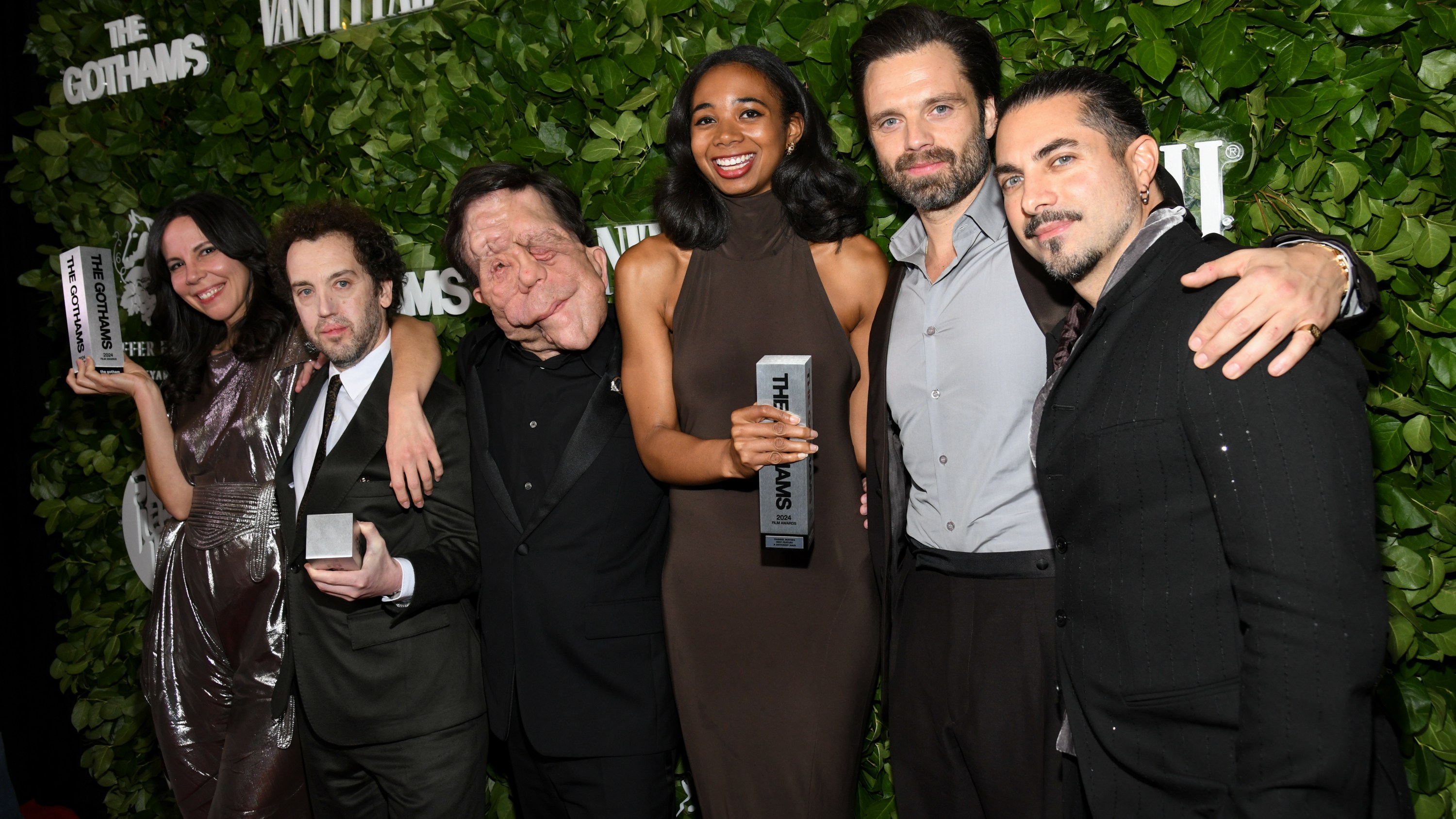 Vanessa McDonnell, Aaron Schimberg, Adam Pearson, Gabriel Mayers, Sebastian Stan, Mike Marino pose with McDonnell, Schimberg and Mayers' Best Feature awards for 'A Different Man' at the 34th Annual Gotham Awards held at Cipriani Wall Street on December 02, 2024 in New York, New York. (Photo by Kristina Bumphrey/Variety via Getty Images)