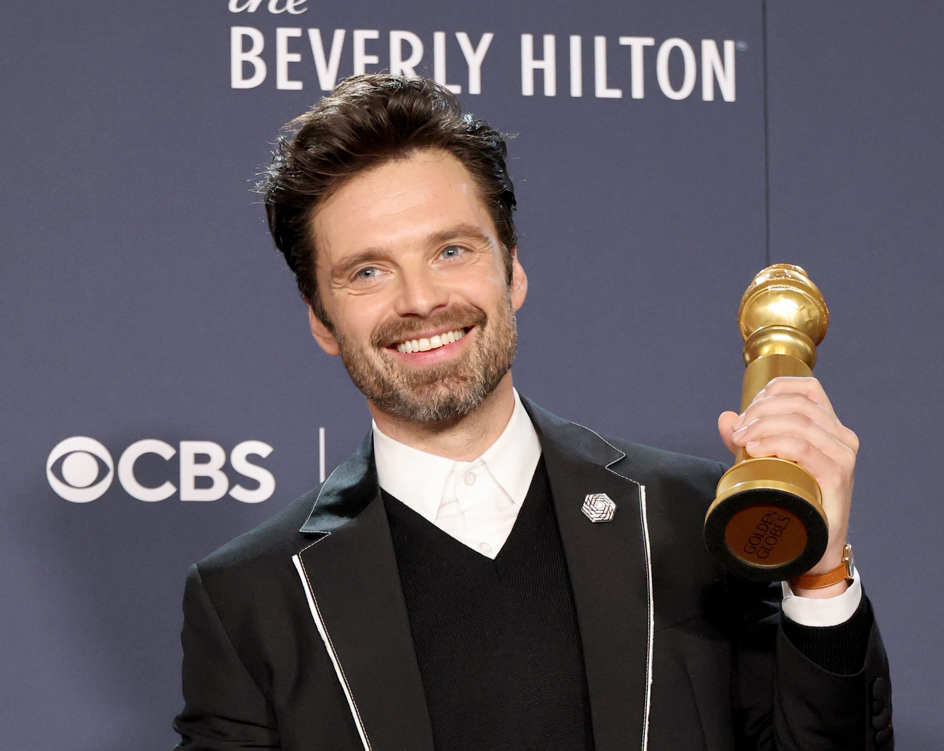 Sebastian Stan at the Golden Globes after winning for 'A Different Man'