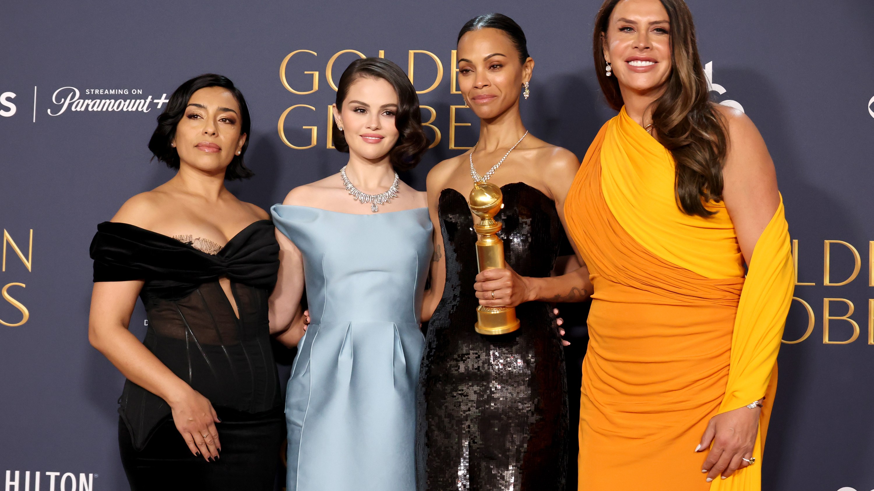 BEVERLY HILLS, CALIFORNIA - JANUARY 05: (L-R) Adriana Paz, Selena Gomez, Zoe Saldana, winner of the Best Performance by a Female Actor in a Supporting Role in Any Motion Picture award for “Emilia Pérez,” and Karla Sofía Gascón pose in the press room during the 82nd Annual Golden Globe Award at The Beverly Hilton on January 05, 2025 in Beverly Hills, California.  (Photo by Amy Sussman/Getty Images)