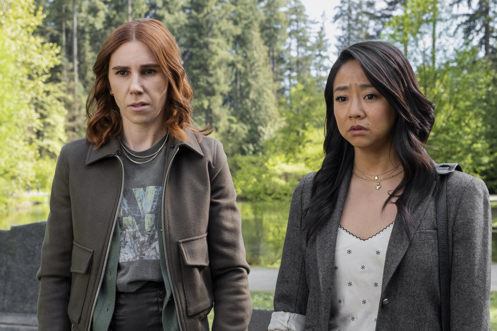 Two women staring seriously at something O.S.; Zosia Mamet and Stephanie Hsu in 'Laid'